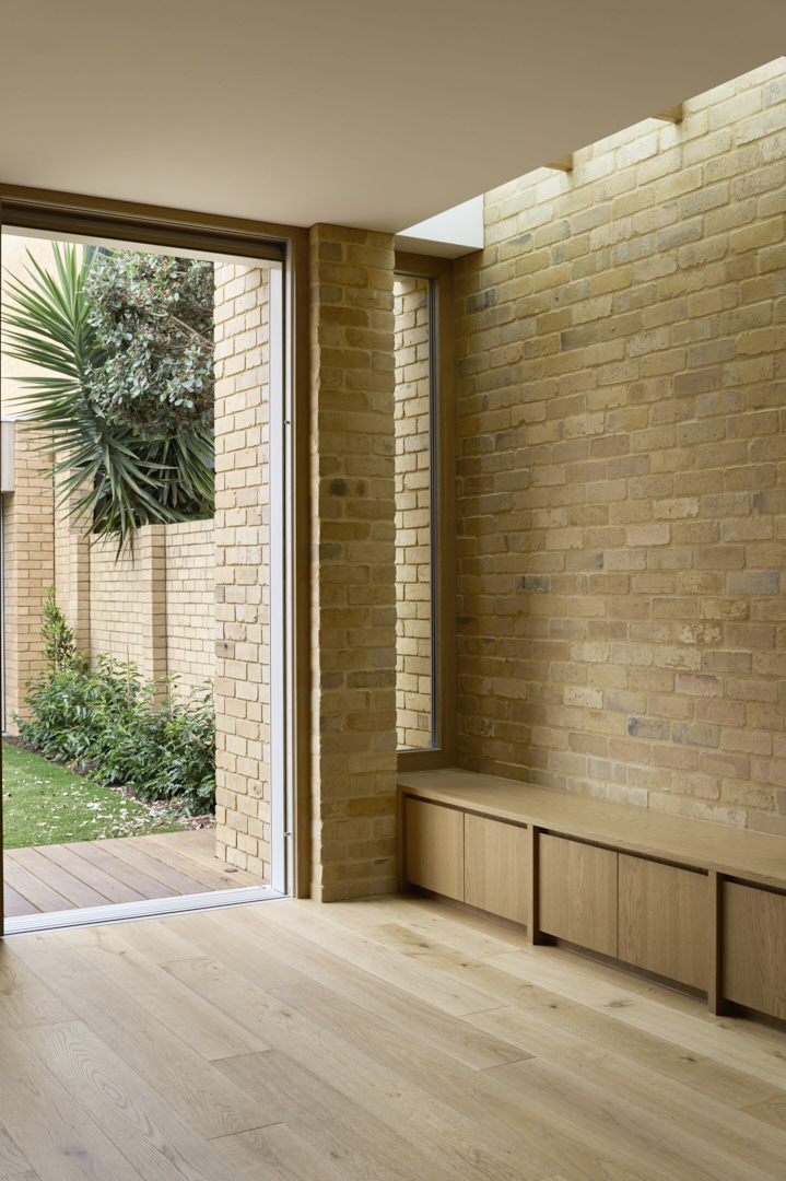 Living space in Fitzroy Passivhaus renovation with natural light and high-performance glazing