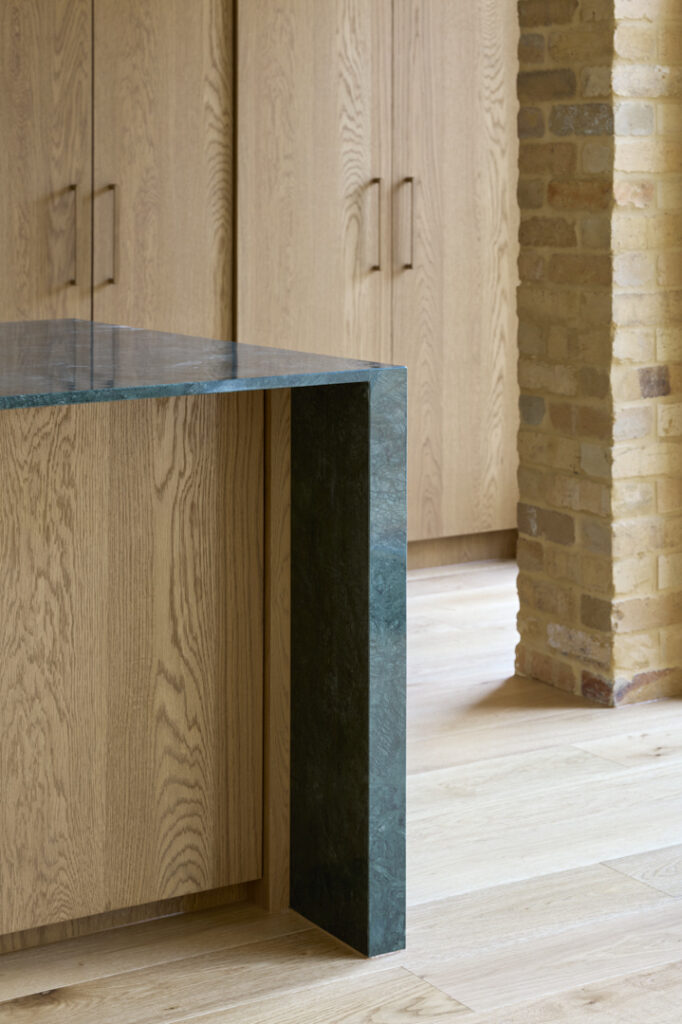 Detail of the green stone island bench.